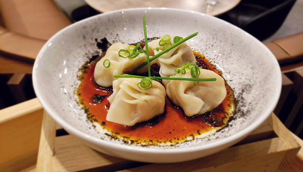 Steamed dumplings served at the Urban Pantry food hall concept at Aventura Hotel. Steamed dumplings served at the Urban Pantry food hall concept at Aventura Hotel.