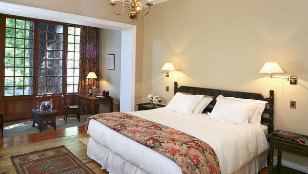 A guestroom at the Hotel Casa Real, a 16-room property that was built by the founder of the Santa Rita Winery as a second home. A guestroom at the Hotel Casa Real, a 16-room property that was built by the founder of the Santa Rita Winery as a second home.