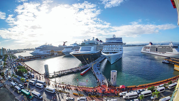 Multiple ships docked together at the cruise ship piers in Old San Juan as the recovery continues. San Juan has 14 cruise ships making calls or homeporting this year, four more than it had going into the 2017 storm season.
