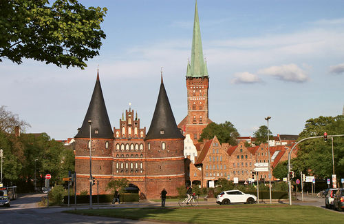The 15th-century Holsten Gate with St. Peter’s Church in the background in Lubeck. The 15th-century Holsten Gate with St. Peter’s Church in the background in Lubeck.