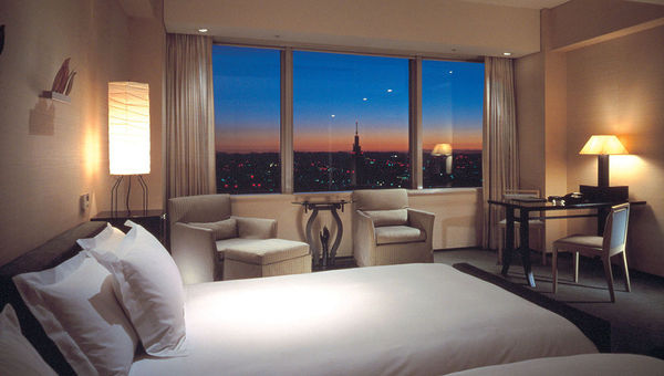 A deluxe room at the Park Hyatt, which occupies the top 14 floors of a 52-story building. A deluxe room at the Park Hyatt, which occupies the top 14 floors of a 52-story building.