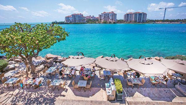 Smith & Wollensky’s South Pointe location features prime rib and prime views of Fisher Island. Smith & Wollensky’s South Pointe location features prime rib and prime views of Fisher Island.