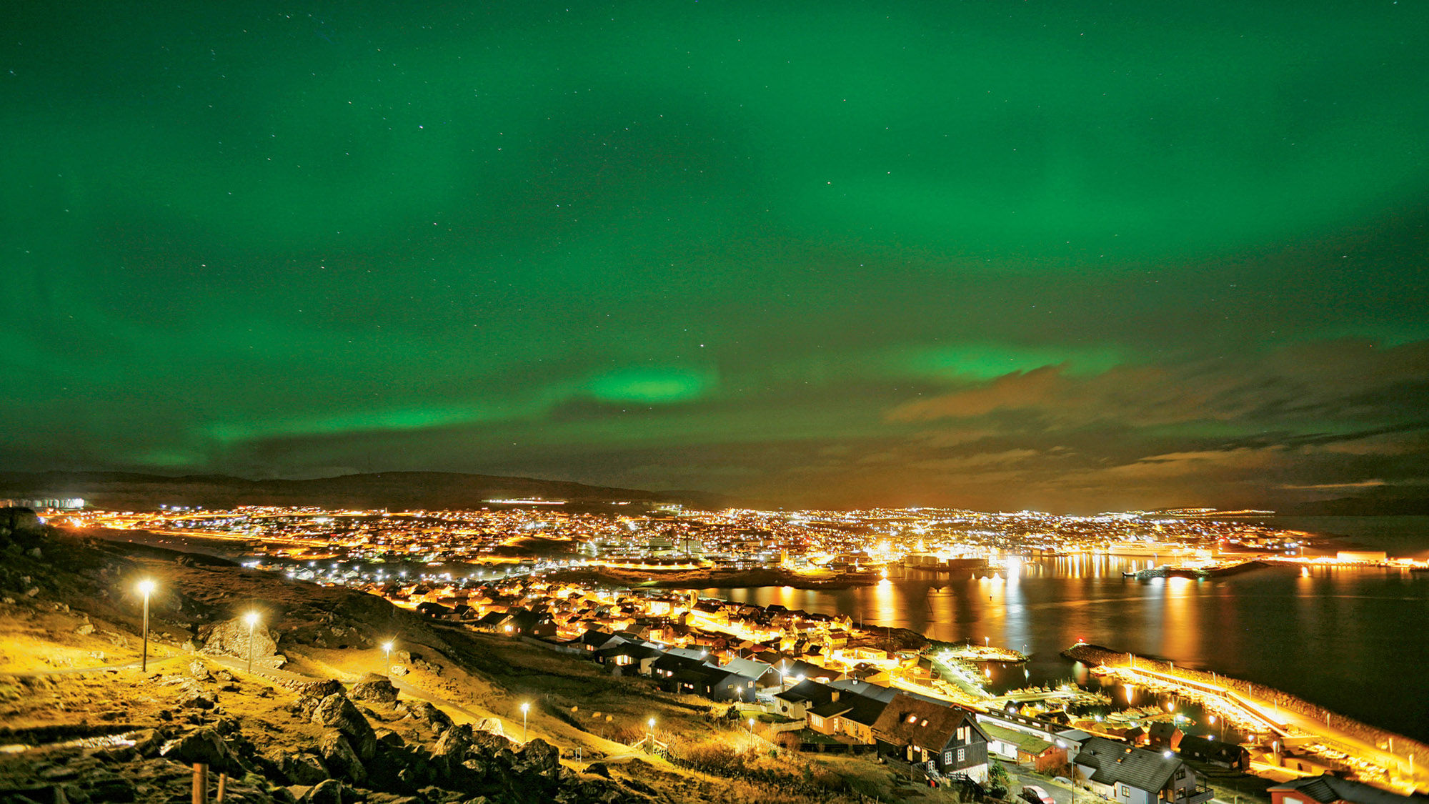 The aurora borealis over the Faroe Islands, some of the most remote and rugged locations on Earth.