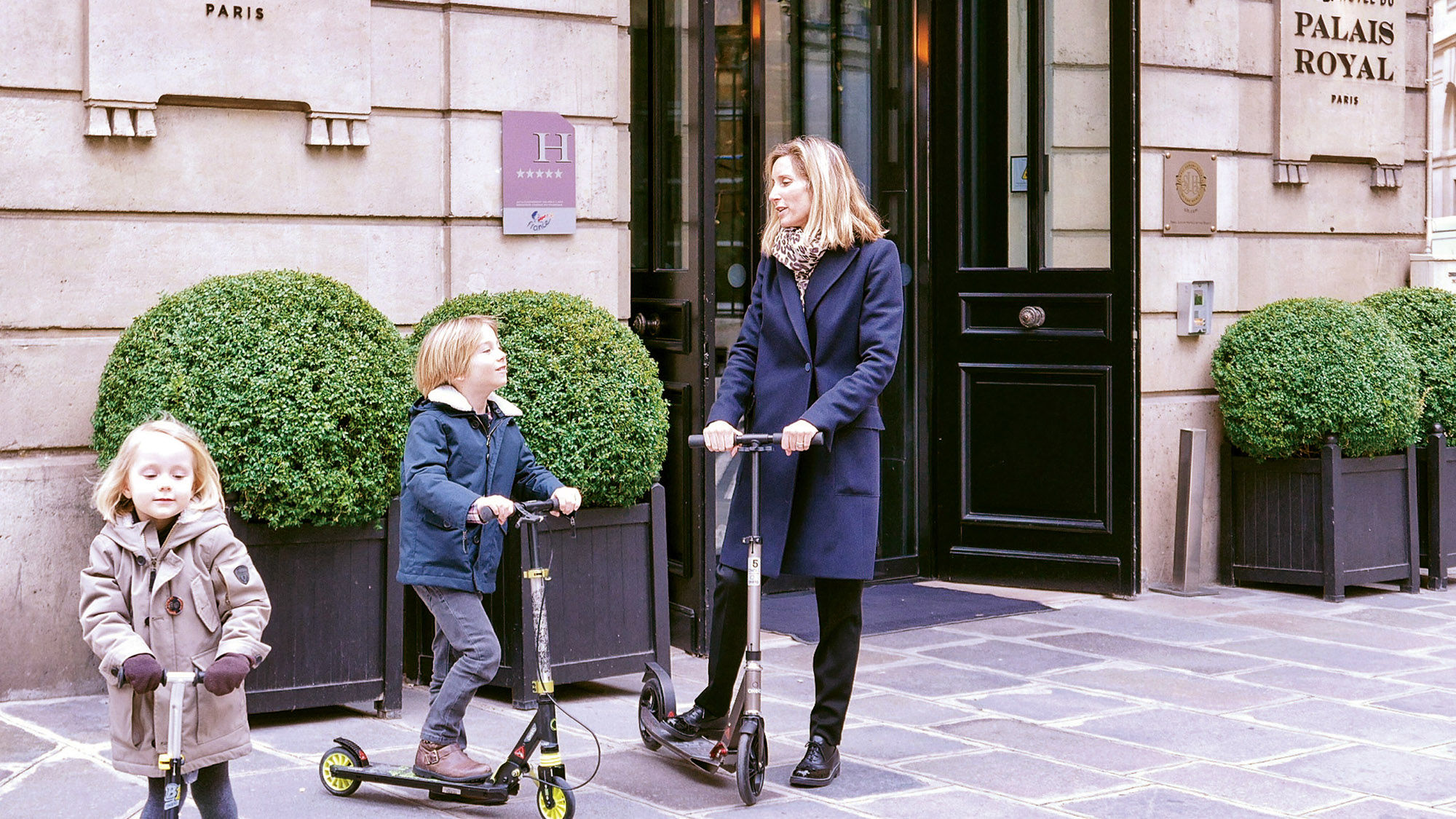 Families can tool around the elegant neighborhood on the hotel’s scooters.