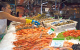 A seafood vendor at the La Boqueria market, which claims origins dating to the 13th century but officially opened in 1836 and became an indoor market in 1914.