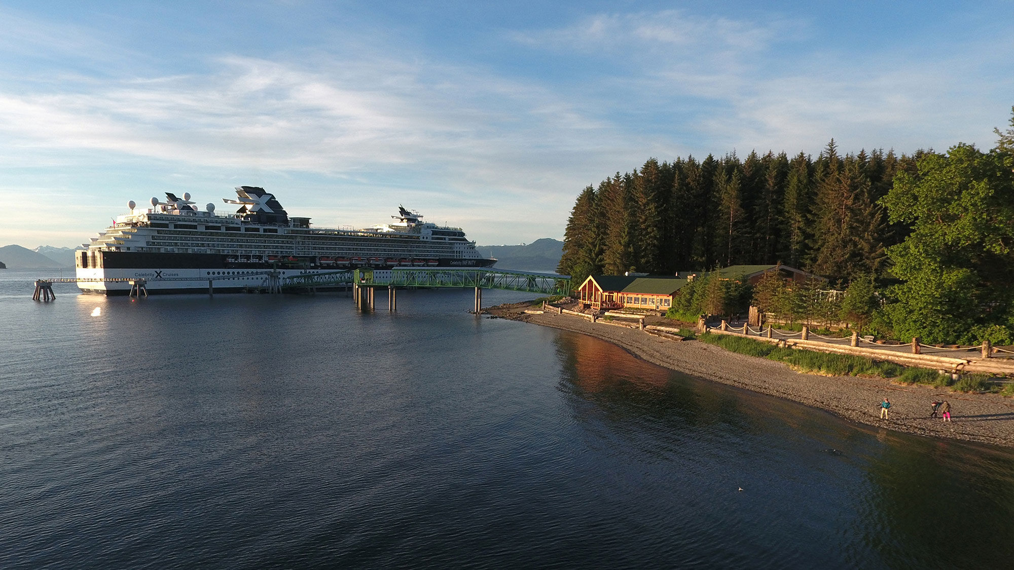 The Celebrity Infinity docked alongside the Duck Point Grill at Icy Strait Point.