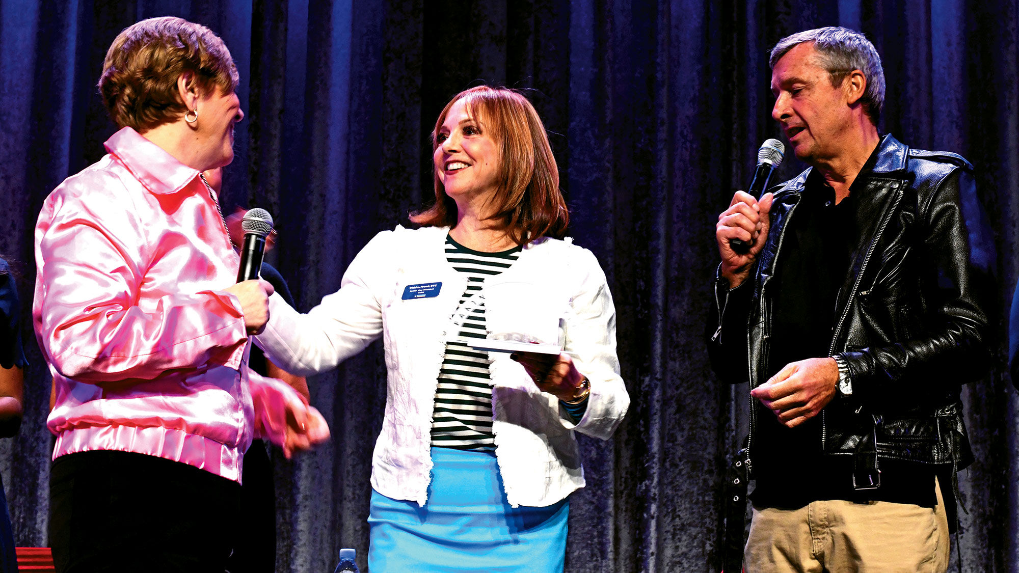 From left, Nexion's Jackie Friedman and Royal Caribbean's Vicki Freed and Michael Bayley on stage of the CoNexion 2018 conference.