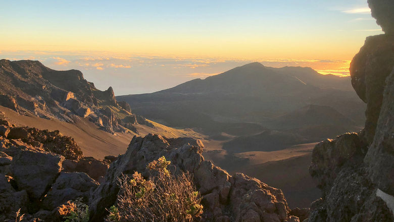 Sunrise reveals the rugged terrain at the summit of Haleakala, Maui’s massive shield volcano.