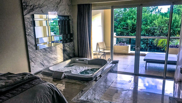 A room at the Grand Moon Palace, the luxury section of the all-inclusive, 2,300-room Moon Palace resort. A room at the Grand Moon Palace, the luxury section of the all-inclusive, 2,300-room Moon Palace resort.