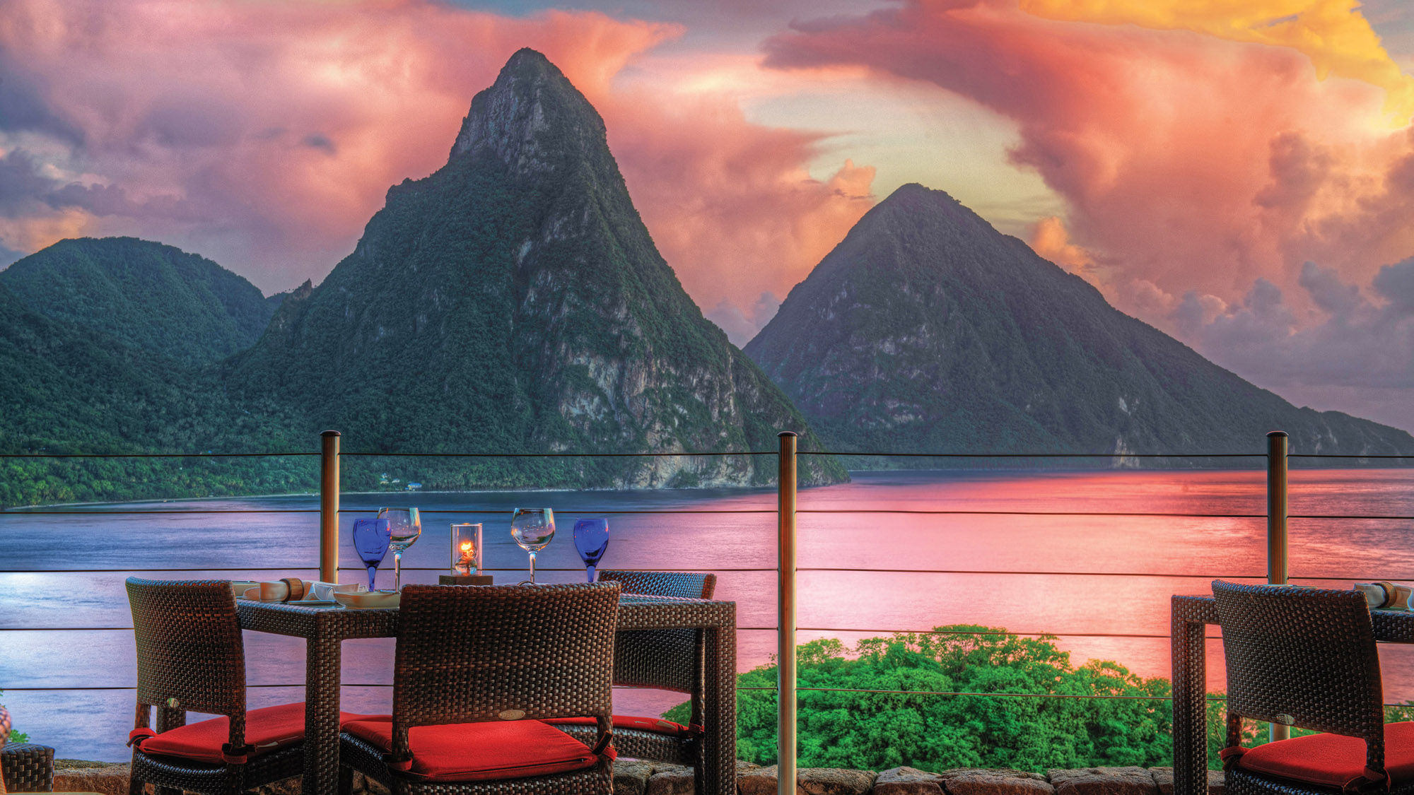 St. Lucia’s majestic Pitons at sunset as seen from Jade Mountain’s Celestial Terrace.