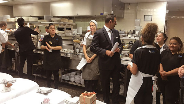 The morning shift at the Ritz-Carlton in Uptown Dallas begins with a reading of the service credo. The morning shift at the Ritz-Carlton in Uptown Dallas begins with a reading of the service credo.