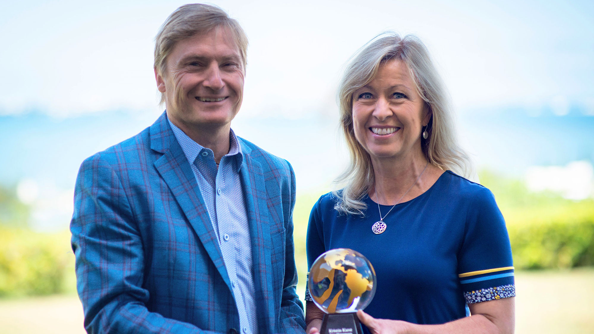 Rainer Jenss, president and founder of Family Travel Association, with Kristin Karst, executive vice president and co-owner of AmaWaterways, the FTA Person of the Year.