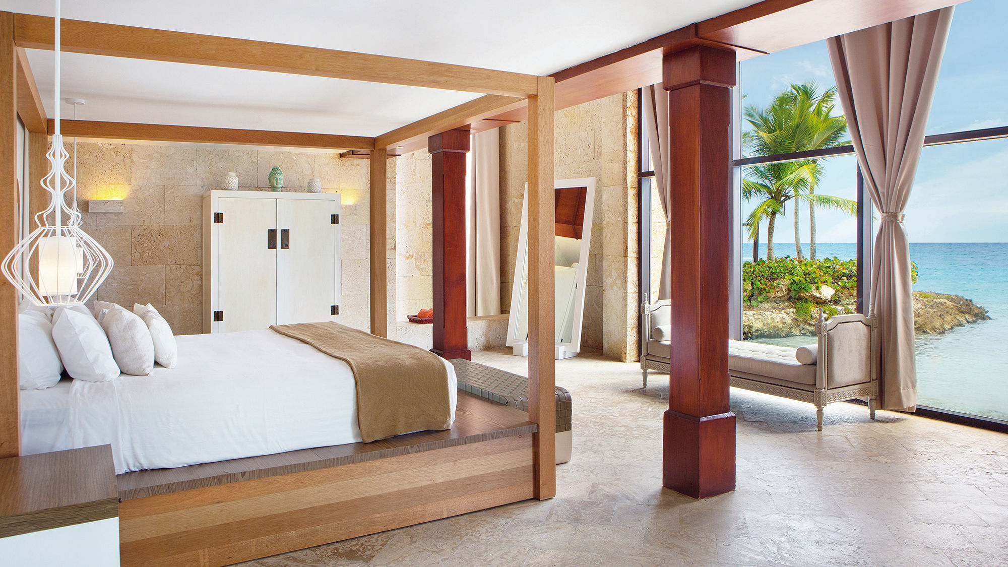 A Castle Island Suite master bedroom at Sanctuary Cap Cana.