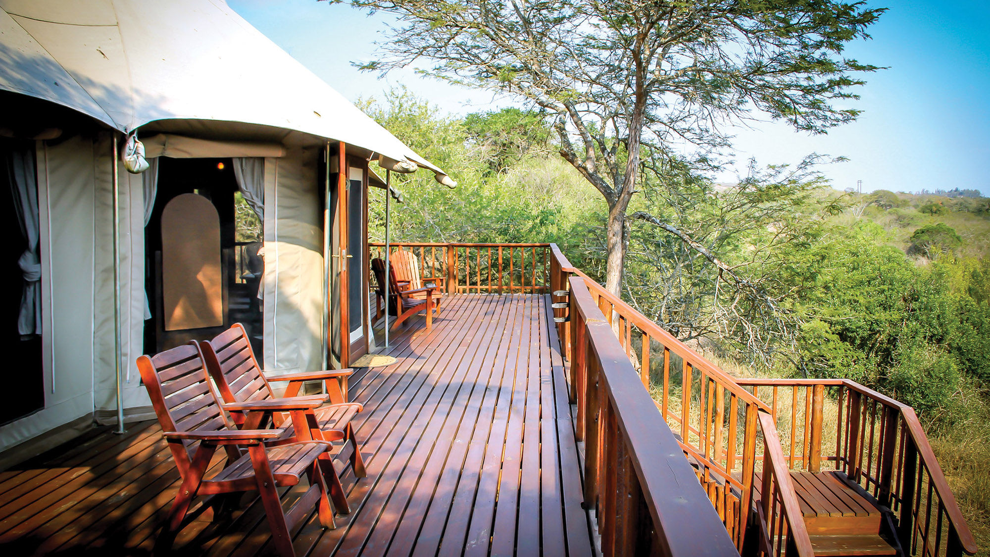 The deck of a family tent at Thula Thula offers valley views and is a great place for a morning coffee.