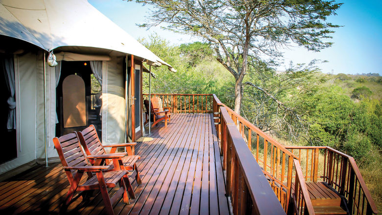 The deck of a family tent at Thula Thula offers valley views and is a great place for a morning coffee.
