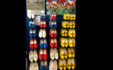 A wall full of wooden clogs, one of the favorites at souvenir stores across the Netherlands.