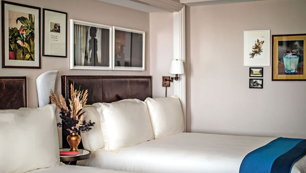 The room design at the NoMad Las Vegas is residential, with art vignettes and custom furniture. The room design at the NoMad Las Vegas is residential, with art vignettes and custom furniture.