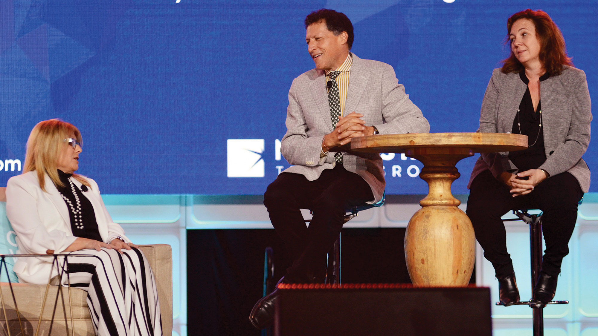 Celebrity Cruises CEO Lisa Lutoff-Perlo (left) with Presidents' Panel co-moderators Arnie Weissmann and Mary Pat Sullivan.