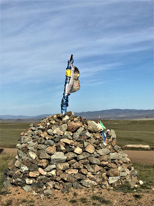 An ovoo along the highway.