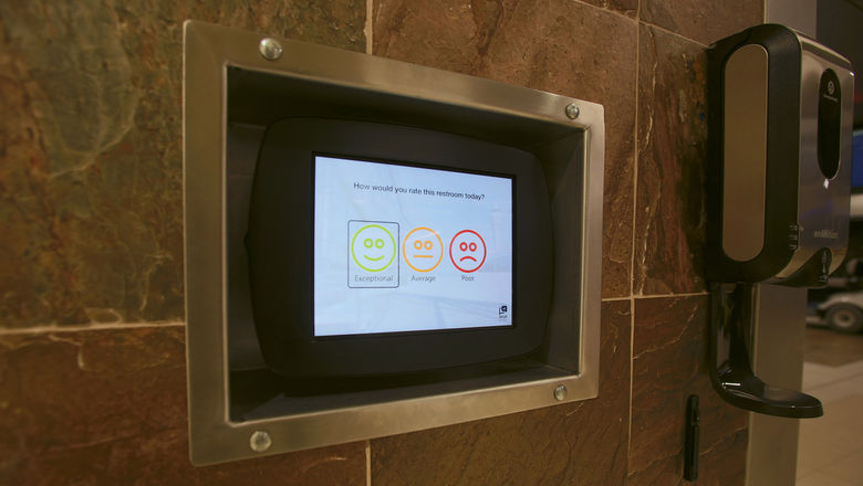 A tablet for travelers to report their airport bathroom experience.