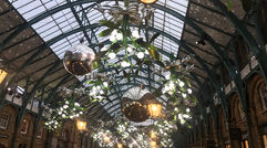 Need a little help getting in the holiday spirit? Check out our slideshow from the festive streets of London. Pictured, decorations in an open air shopping area in Covent Garden.