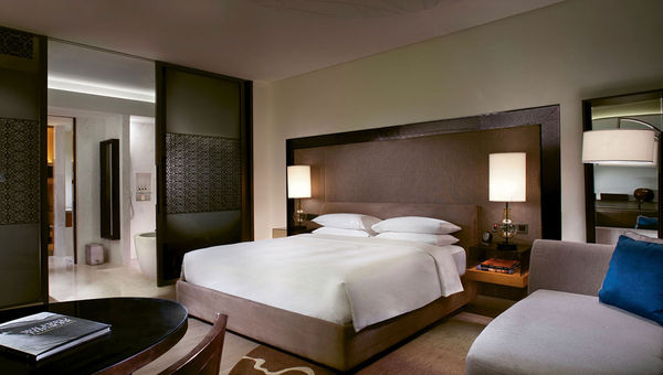 A king room at the Park Hyatt. Sliding doors close off the bathroom area as needed. A king room at the Park Hyatt. Sliding doors close off the bathroom area as needed.