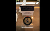 Holland America Line has added a table-top call button on the Nieuw Statendam that fetches waiters in the Lido buffet to order wine, beer and drinks of the day.