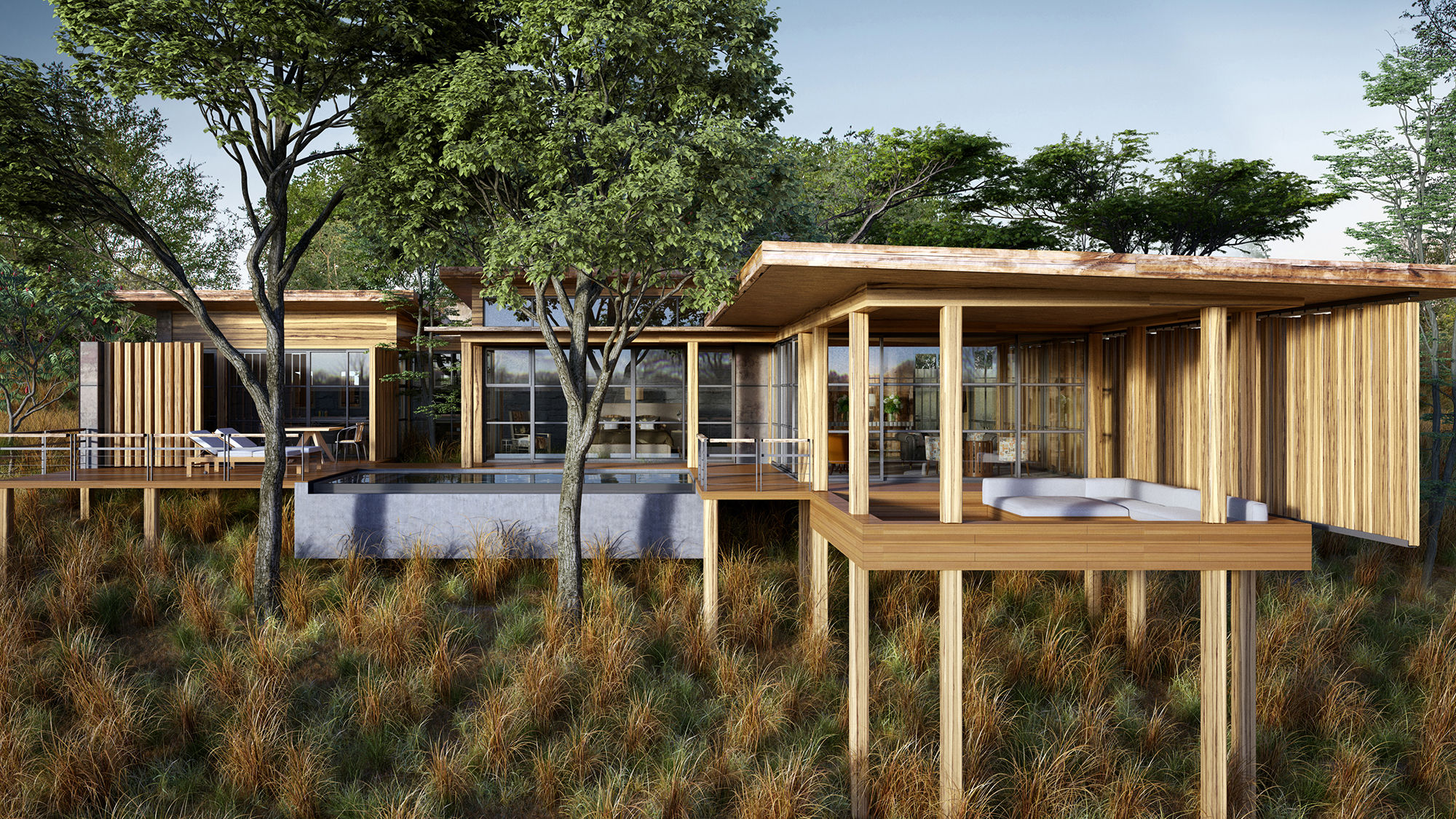 Raised above ground level, the spacious suites at the AndBeyond Tengile River Lodge offer sunken lounges as well as bedrooms and bathrooms that open out onto a forest.