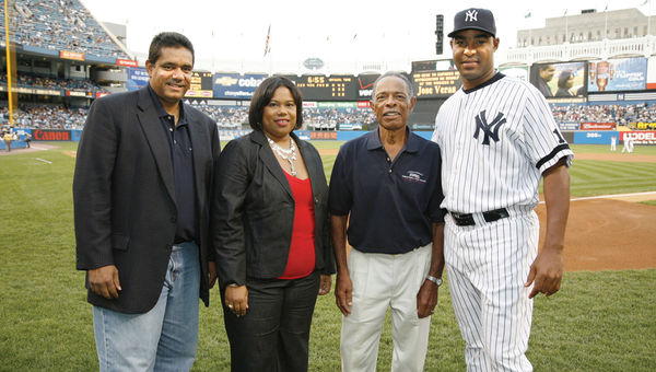 Early in her 12-year tenure, in 2007, Nicholson-Doty visited New York to launch a marketing partnership between the U.S. Virgin Islands Department of Tourism and the New York Yankees. With Nicholson-Doty, from left: John deJongh, then the governor of the USVI; Horace Clarke, a former Yankee and native Virgin Islander; and relief pitcher Jose Veras.