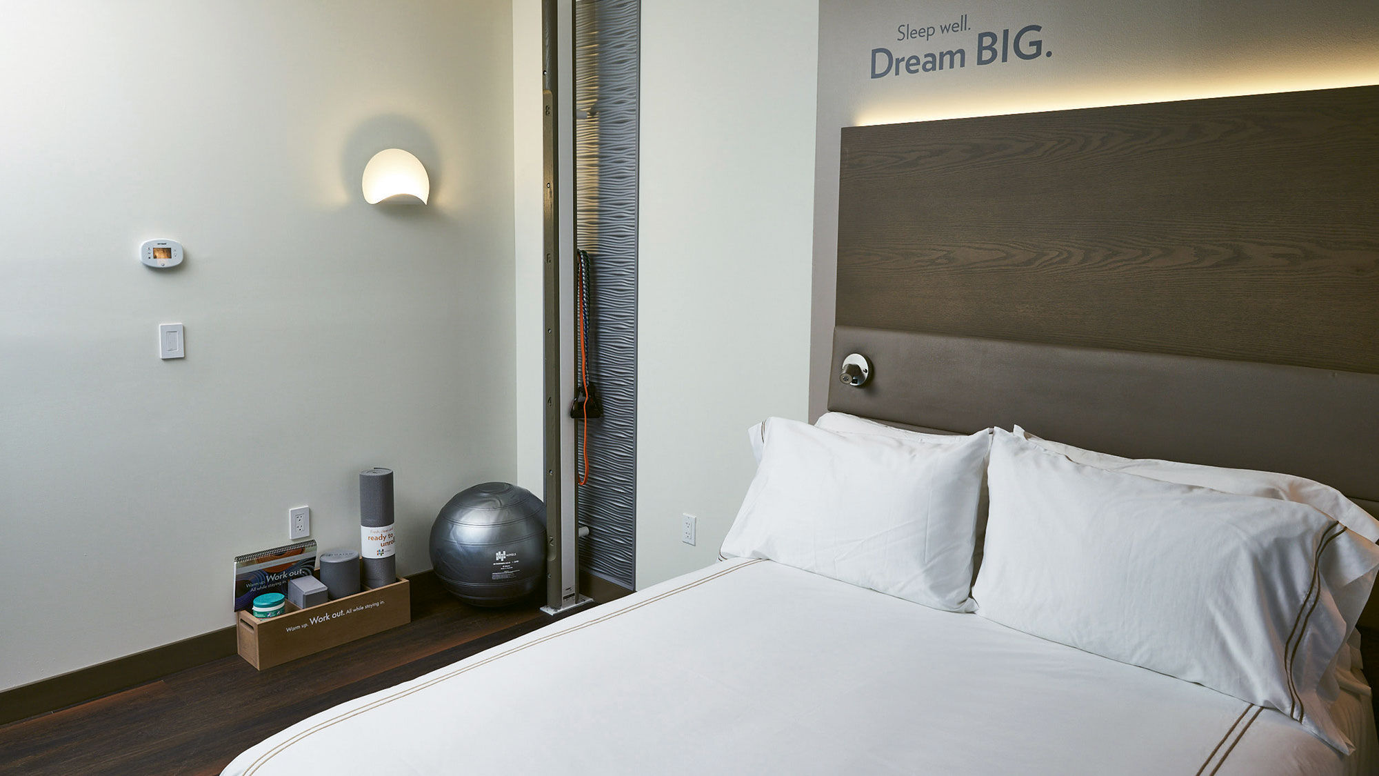 A guestroom with minigym at the Even Hotel Miami Airport.