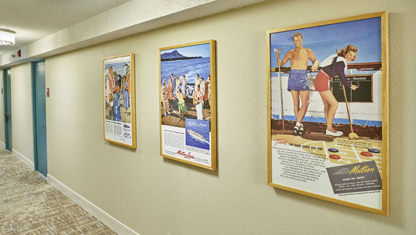 Vintage posters line a hallway at the Waikiki hotel. Vintage posters line a hallway at the Waikiki hotel.