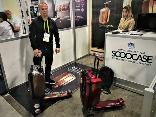The Scoocase, a suitcase with a built-in electric scooter that can go 15 miles per hour. The Scoocase, a suitcase with a built-in electric scooter that can go 15 miles per hour.
