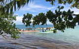 Islanders getting ready to take their outrigger canoes out for ride off Moorea.
