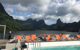 The pool deck on the Paul Gauguin anchored off Moorea.