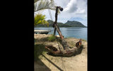 View from the Huahine Yacht Club, which uses an old anchor to tie down its awning.