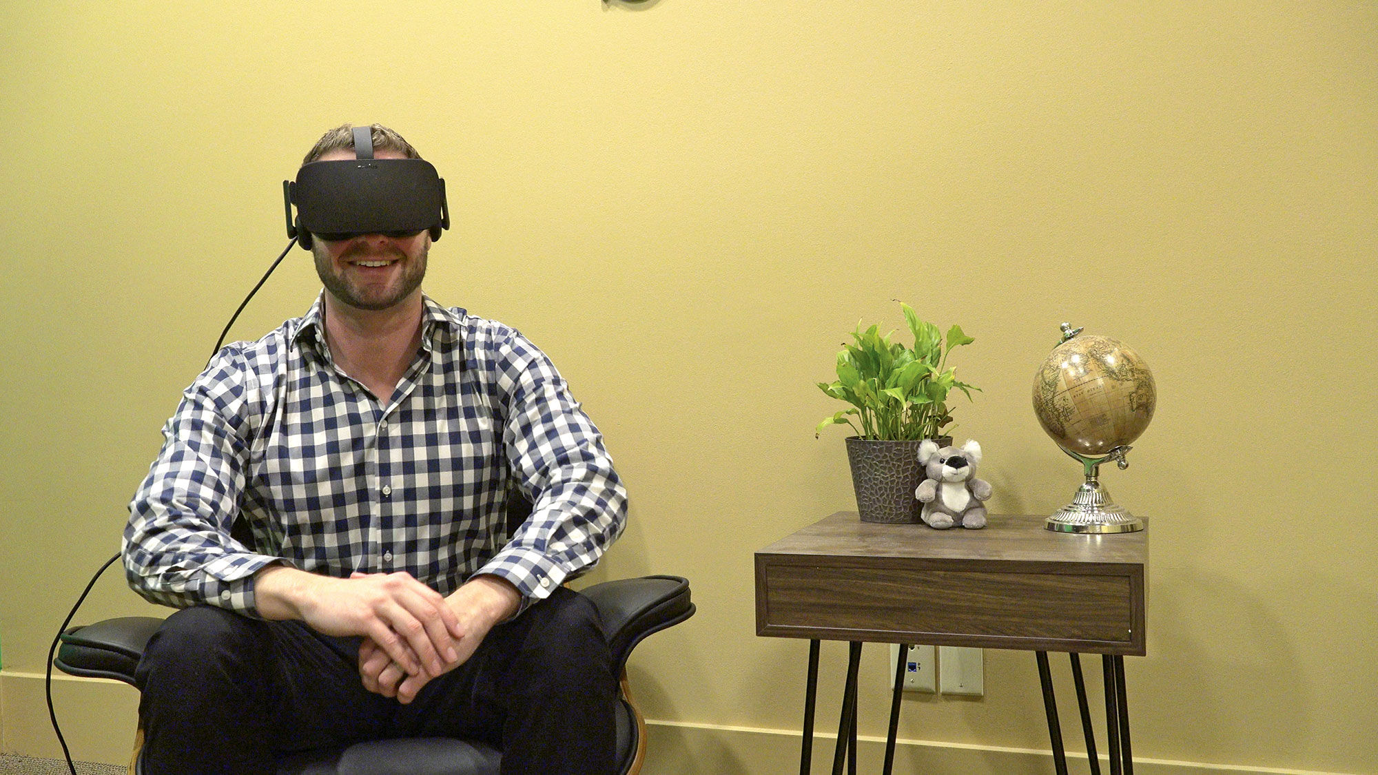 Scott Largay, director of marketing at Largay Travel in Waterbury, Conn., using a VR headset. He is a proponent of virtual reality for agencies but said the quality of content he wants to use isn't available yet.