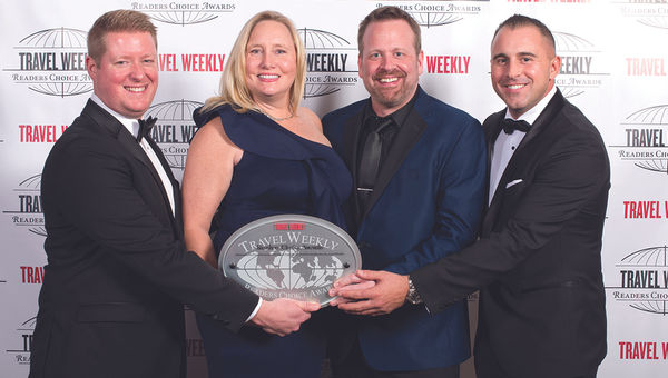 Kevin McCullough, Tracee Adams, John Van den Heuvel and Brennan Quesnele of Gogo Vacations, winner in the Group Packaged category.