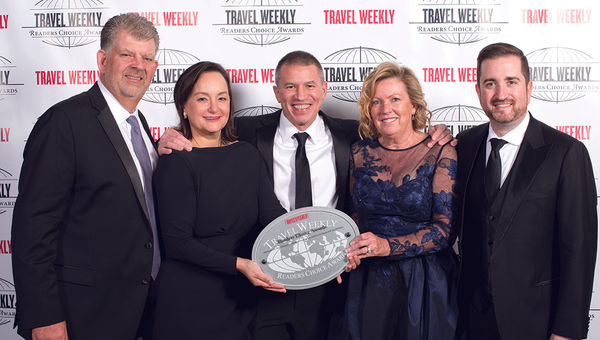 John Diulus, Meg Lee, Camille Olivere, Andy Stuart and Nathan Hickman of Norwegian Cruise Line, winner in the Travel Agent Loyalty Program category as well as for Hawaii/Pacific and the Cruise Ship: New category (for the Norwegian Bliss).