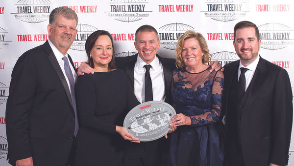 John Diulus, Meg Lee, Camille Olivere, Andy Stuart and Nathan Hickman of Norwegian Cruise Line, winner in the Travel Agent Loyalty Program category as well as for Hawaii/Pacific and the Cruise Ship: New category (for the Norwegian Bliss).