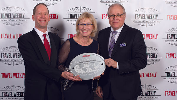 Doug Johnson, Inna Germanotta and Jonathan Hope of Rocky Mountaineer, winner for Rail Vacation.