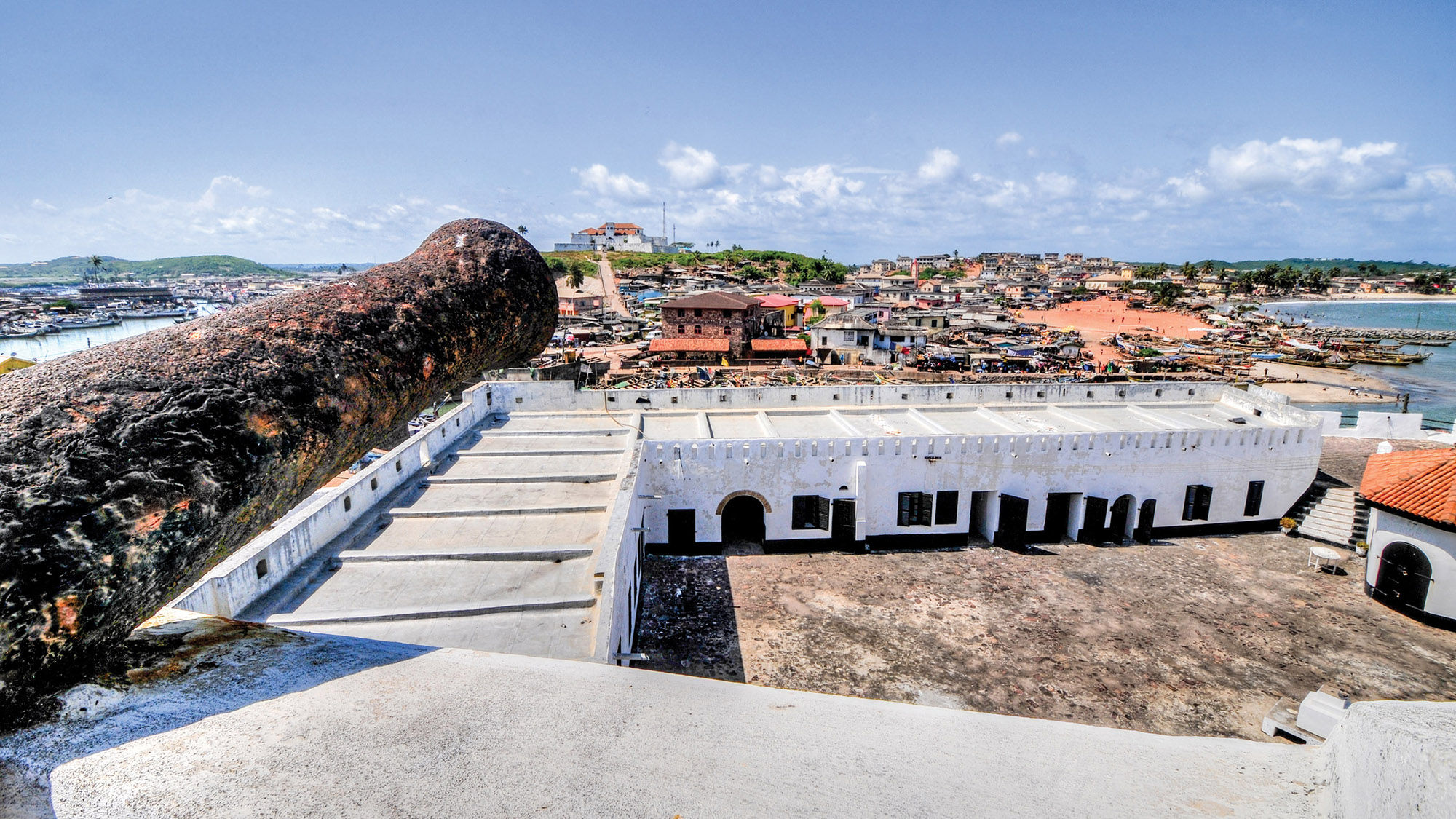 Elmina Castle (also called the Castle of St. George) is located on the Atlantic coast of Ghana west of the capital, Accra. It is part of the UNESCO World Heritage Site.