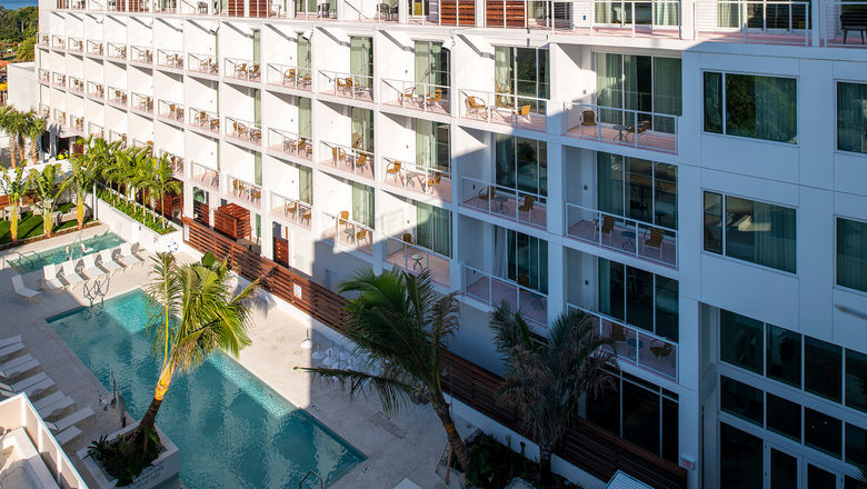 View of the guestroom balconies and pool deck at the Sarasota Modern.