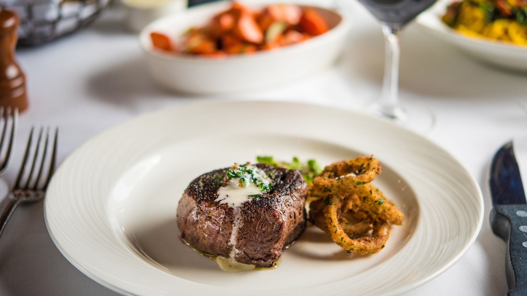 Filet mignon with classic onion rings from the Palm at the Hard Rock Hotel at Universal Orlando Resort.