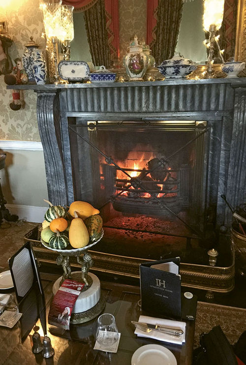 A fireplace at Longueville House, a 20-room, family-owned property. A fireplace at Longueville House, a 20-room, family-owned property.