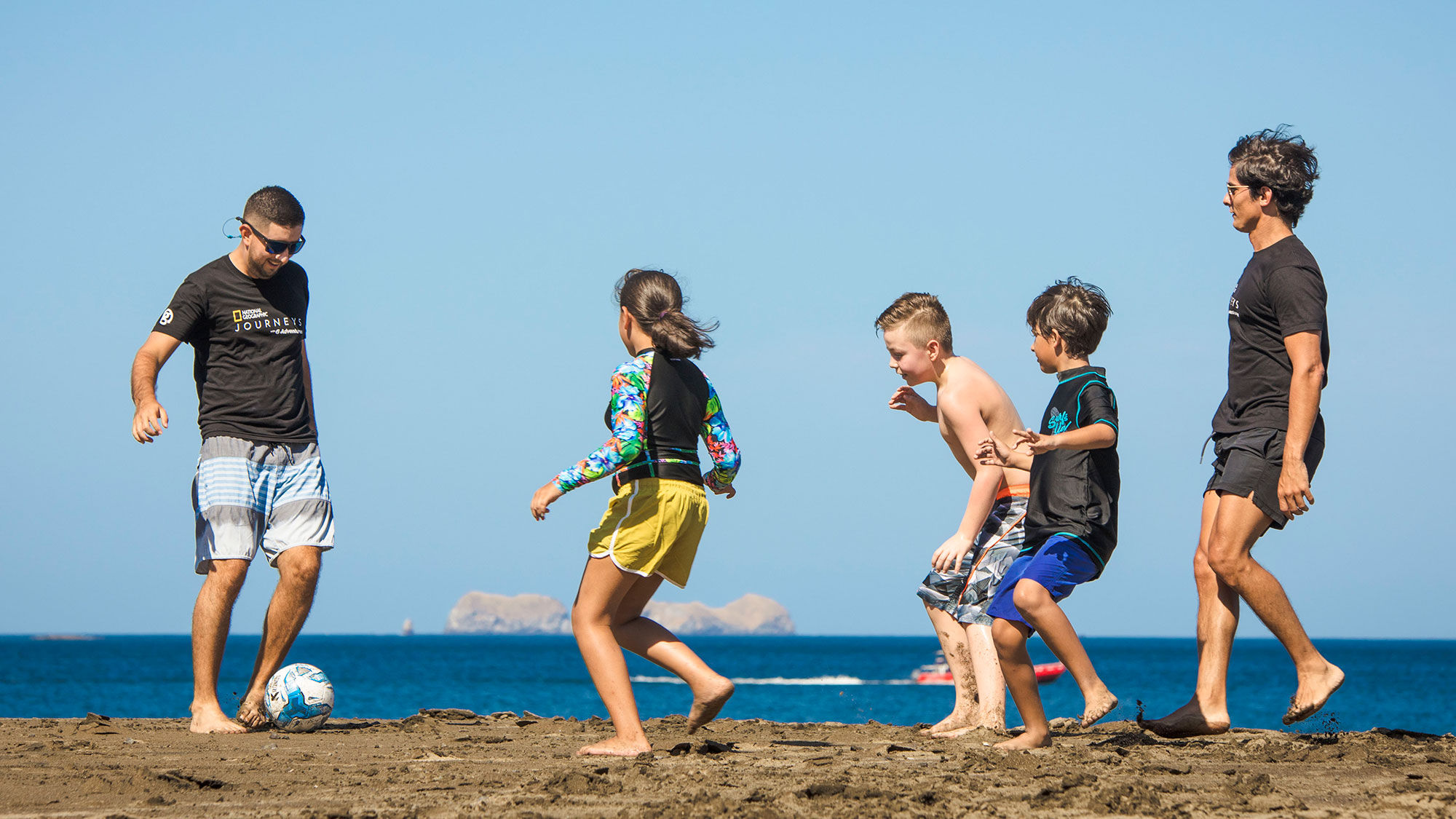 A game of pick-up soccer on the beach in Costa Rica.