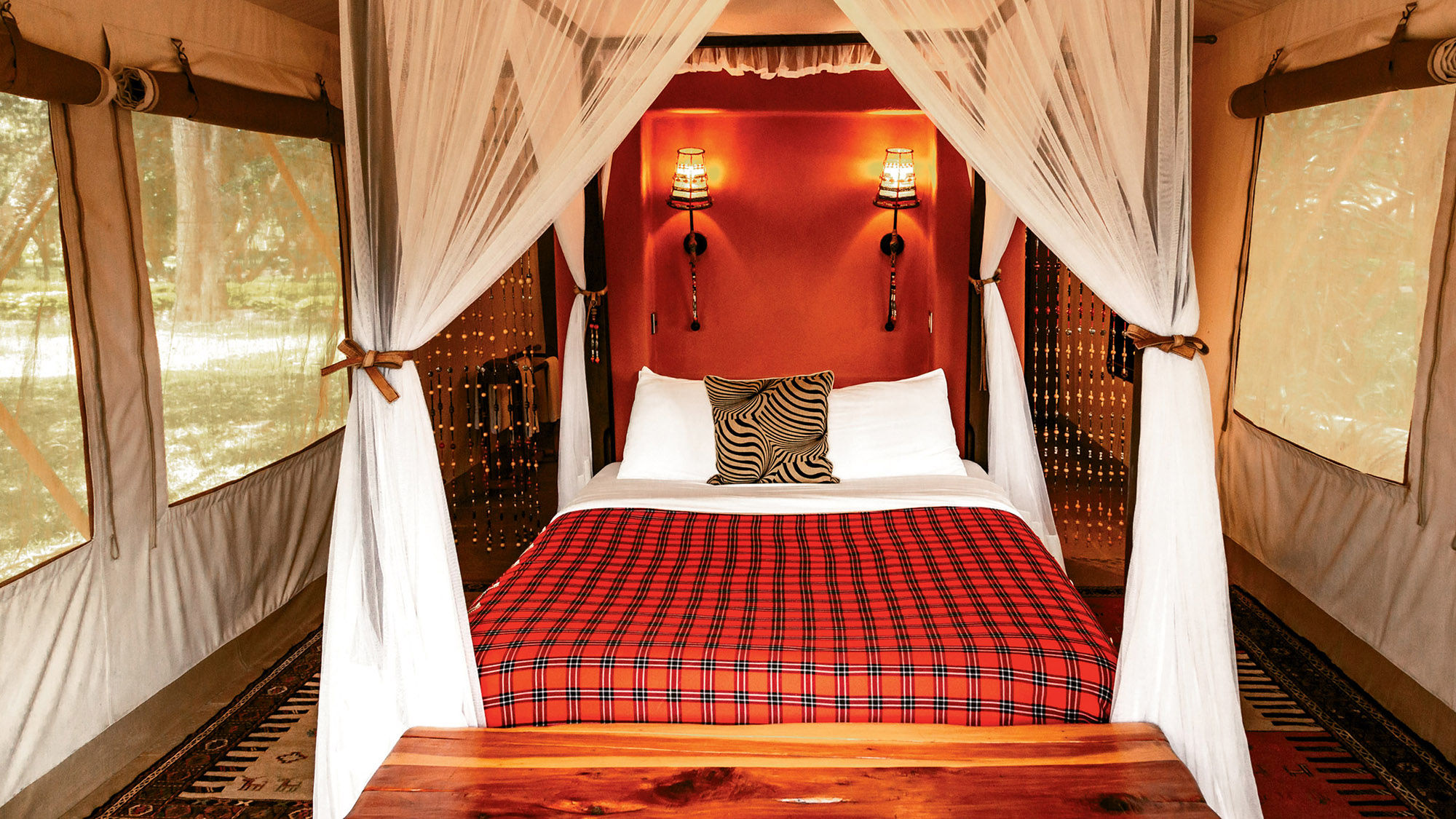 At the Fairmont Mara Safari Club on the banks of the Mara River, accommodations are platform tents.