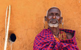 An elder Masai man at a Masai Mara village in Kenya, in a visit arranged by the Fairmont Mara Safari Club.