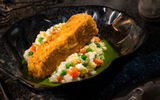 The Fried Endorian Tip-Yip, found at Docking Bay 7 Food and Cargo, is a chicken dish with roasted vegetable mash and herb gravy.