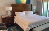 Updated rooms feature white walls and linens and pops of sea-inspired hues.
