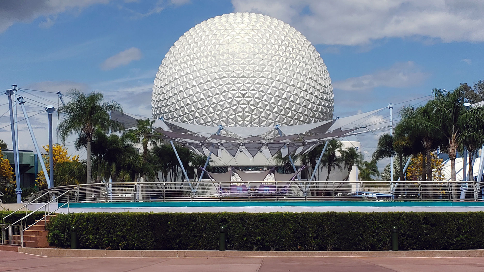 A redo of Epcot's entrance will get include large green spaces and a new fountain.